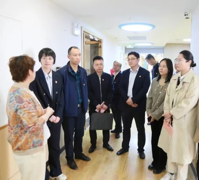图为走访南昌慧聪儿童康复训练中心